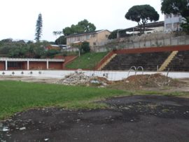 Piles of rubble lay strewn at the top of the empty Olympic sized pool, which has been closed since July 2017.