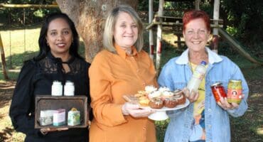 Vendors of the St Columba Anglican Parish, Nadine Mangli, Beverly Payet and Janet Otto, are ready for the church's fundraising market on August 2. They are inviting other vendors to join and the community to support the market.