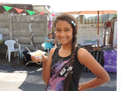 Micaela van Heerden invites visitors to sample the tasty pate she sells at the market.