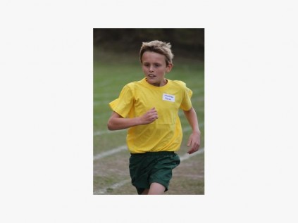 Izotsha Primary pupil Matthew Bense from Jaguar heads for the finish line.