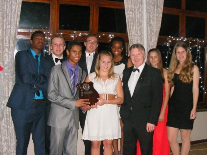 Sheppie High drama pupils (back, from left) Yamkela Mqwebedu, Jason Love, Chris Dreyer, Andiswa Mqedlana, Emilie Wood, Bianka Thom, and (front) Yogeshan Pillay, Robynne Theron and principal, Peter McKillen with the trophy awarded for winning the 'Amazing Race'.