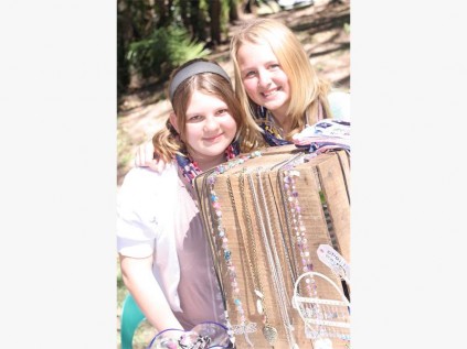  Kera van Zyl (left) of Shelly Beach and Megan Strickland of Uvongo man their stall. 