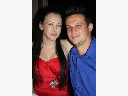 Angela Lowery and Marc Ansermino have a great time at the masked ball.
