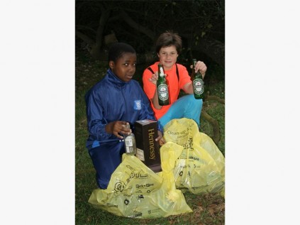 Sibongakonke Ncwana (left) of Port Shepstone and Monique van Rooyen of Umzumbe support International Coastal Clean-up Day. 