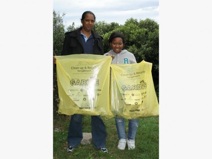 Leaving the Port Shepstone beachfront spotless are Rani Govender of Marburg and Anele Mbonane of Port Shepstone. They were two of the enthusiastic South Coasters who pitched in to do their bit for International Coastal Clean-up Day last Saturday. 
