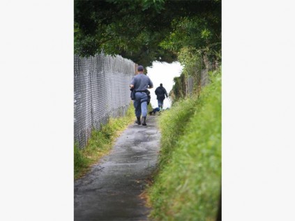 Police arrive at the footpath between Port Shepstone Secondary and Jai Hind Primary where a 40-year-old man was found murdered on March 1.