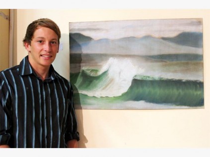 Sheppie High matriculant Wesley Coetzee proudly displays his stormy seascape.