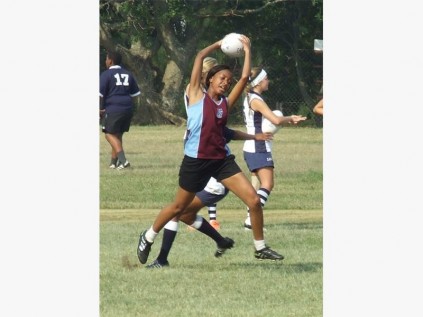 Anesu Pawandiwa of PSHS gets possession of the ball at the touch rugby friendly against Southcity recently.