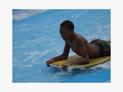 Grade 7 pupil Sean Nakani from Port Edward Primary battles through the waves at the Durban Wave House.