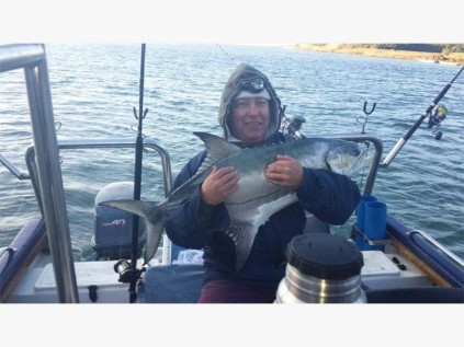 Mark Perreira with a 12kg garrick boated at Port St Johns.