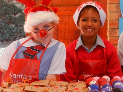 Creston gr 2 pupils Sammy Rieger (left) and Levi Wilcox are open for business at their mini market day recently.