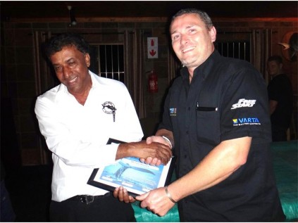 Gary Moodley (left) receives a Lions' appreciation certificate from Shelly Beach Lions Club president, Clinton Barclay, in recognition of his ongoing support for club projects.