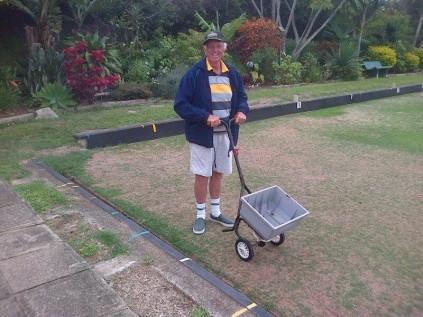 Danny McCarthy gives the greens a fix of fertisiler during the annual treatment programme at Margate Bowling Club.