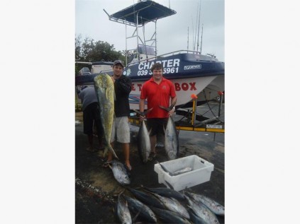 Brandon Poole (left) and Chappies Stoltz fishing on Tackle Box with a good catch of tuna and a good-sized bull dorado.