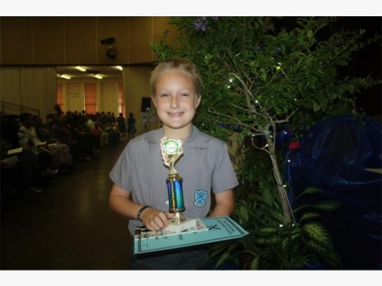  PS Junior Primary pupil Brent Richter received a trophy for excellent manners, a book prize for academic achievement and a certificate of merit.