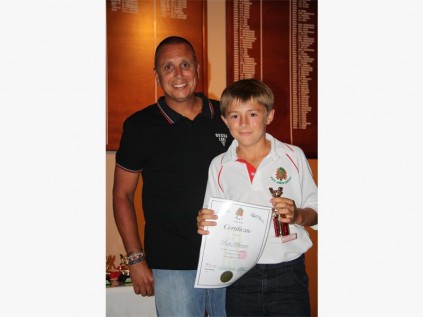 Ross Klusener receives his award from guest speaker Shaun Warner from Simply Cricket, a level three coach from Hillcrest. Ross was awarded best all-rounder and cricketer of the year for the U11 category. 7039SN
