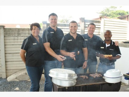 Union Motors staff (from left) Rona Gangerdine, Warren van Staden, André Bester, Basil Britz and Philani Khusi prepare hot dogs for visiting clients.