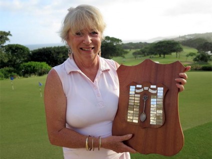 Augustine D'Ewes proudly shows off the Curlewis Shield, which she won at Southbroom Golf Club last week. PHOTO BY SHEENA JAMES