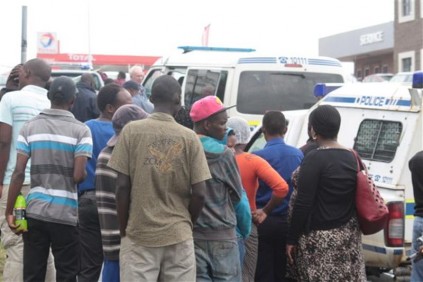 An eyewitness saw a gun in the man's hand.