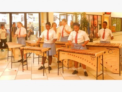 Creston College marimba band members (from left) Caitlin Morton, Sphumelele Khawula, Ashlee Haverly, Phindile Mthembu and Senamile Mthethwa perform for shoppers at Shelly Centre last Saturday.