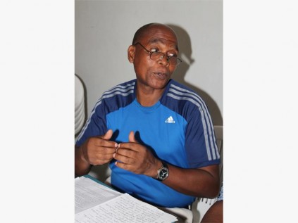 Mcebisi Benjamin Zuma (secretary) addresses senior citizens at the luncheon.