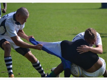 Southcity rugby players Duncan Viljoen (left) and Brandon Venter use clever teamwork tactics against the opposition at the recent Treverton College sports festival held in Mooi River.