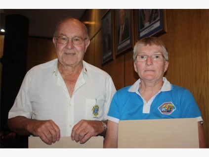 Rob Henry from the Ramsgate Lions and Anne Skelton from Southbroom Conservancy collect their organisations' grants-in-aid.