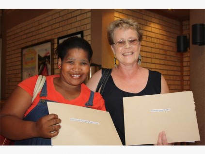 At the grant-in-aid ceremony last Friday are Khonziwe Ngubane of Sizanokuhle Nurturing Care Centre and Gail Allison of Genesis Youth Centre.