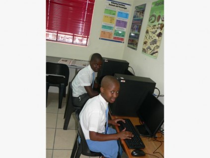 Mbali Cele (left) and Minenhle Ngcobo test the new computers.