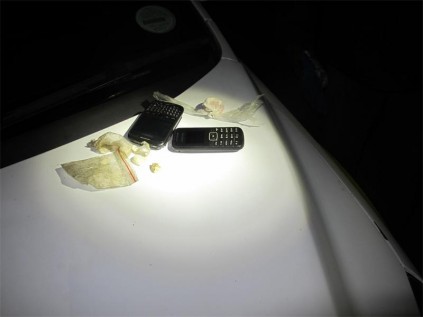 Drugs and cellphones were recovered from the vehicle.