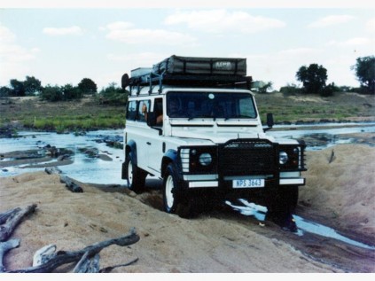 Crossing the Lundi River.