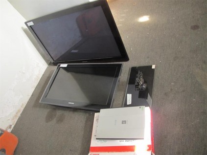 Police recovered suspected stolen TVs and a scanner in Bhobhoyi.