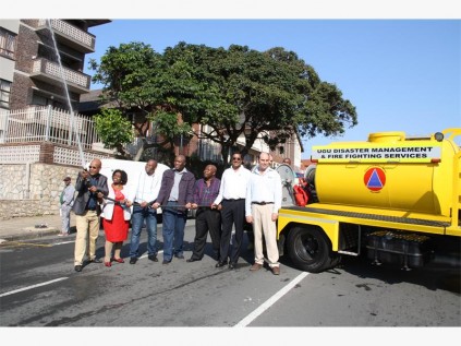Testing the new fire truck are (from left) Umzumbe mayor, Sidney Gumede, Ugu mayor Ntombifikile Gumede, Vulamehlo mayor, Thabani Dube, Umdoni mayor, Siyabonga Khwela, Ezinqolweni mayor, Makhosezwe Mpisi, and Daya Reddy and Noel Allchin of Bates Delta in Port Shepstone.