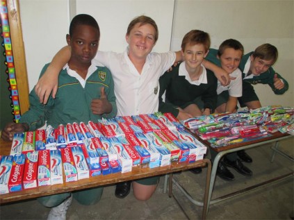 Pupils (from left) Tadiwa Mahwire, Matthew Hunt, Cale Lindecke, Riaan Brookes and Andrew King with the toothpaste and toothbrushes collected.