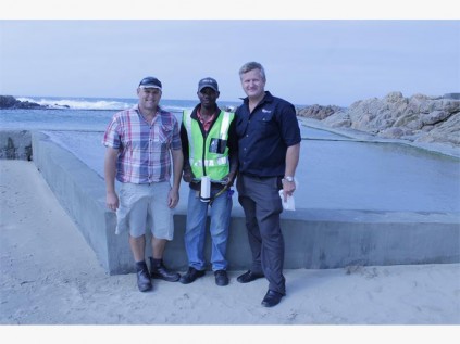 Contractors (from left) Roger Davison and Tom Ntyani and engineer Rowen Clark.