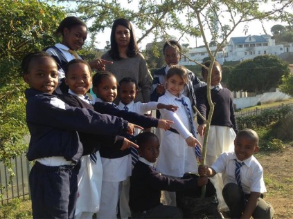 Guest speaker Vasie Manawer (back, middle) joined Port Shepstone Primary pupils (back, from left) Lusanda Miya, Promise Mnguni, (middle row) Lukho Lepheana, Thingo Gwacela, Minenhle Jili, Amina Nobetsiki, Justine Gunther, S’Babalwenamhla Madikizela, (front) Shaun Ndovela and Stembele Zondo plant a tree in commemoration of Arbor Day.