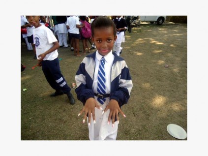 Lithalethu Zulu is really proud of the beautiful nails purchased on market day.