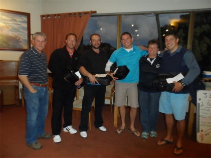 Southcity Christian School CEO Grahame Celliers (left) and sports director Debbie Meyer (second, from right) congratulate Riaan Fourie, Carl Nolte, Pieter de Bruin and Neil du Plessis on winning the school's golf day at Southbroom Golf Club last Friday. SUBMITTED