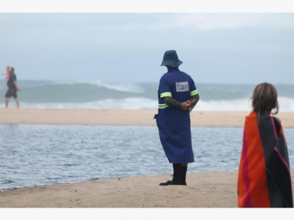 A HCM employee admires the view while taking a stroll along Margate's beachfront.