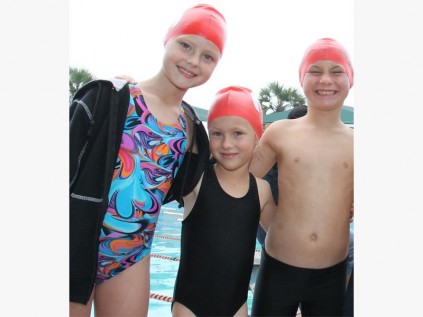 Hannah Parry, Leah Scott and Mason Hielckert of Margate Swimming School.