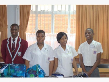 Pupils (from left) Mvelo Hlophe, Elihle Mkize, Phumla Shinga and Lebo Knol each won a hamper at last week's Teenagers Against Drug Abuse (TADA) raffle.