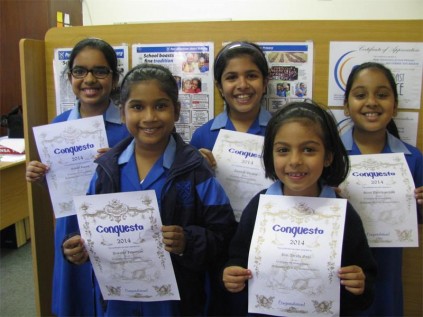 Aaliyah Essack, Amaarah Ebrahim, and Sonal Dwarikapersadh with Priyanka Judnarain and Bibi Ayesha in front show off their certificates. 