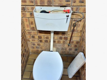 This public toilet in the men's ablution block at Uvongo pier has a broken cistern which discharges water at a wasteful rate.