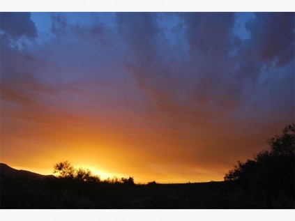 The sky darkens as the clouds accumulate.