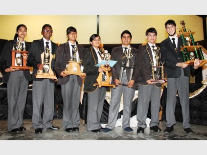 Top achievers were (from left) Tineal Govender (first position, gr 8), Jermaine Jarrard Buchaya (first, gr 9), Karosa Moodley (first, gr 10), Chanel Mevalal (first, gr 11), Pranav Anandh Badrinath (third, gr 12, plus seven subject distinctions), Ishq Rooplal Ramsaroop (dux approxime, plus seven subject distinctions) and Suhail Gangat (placed second in the Ugu District, seven subject distinctions, obtained the highest marks in accounting, physical science, mathematics and life orientation.
