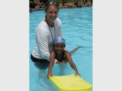 "I’m not so scared when teacher Emma van Vuuren holds me in the pool!" says gr 2 pupil Annsuri Nagaya.