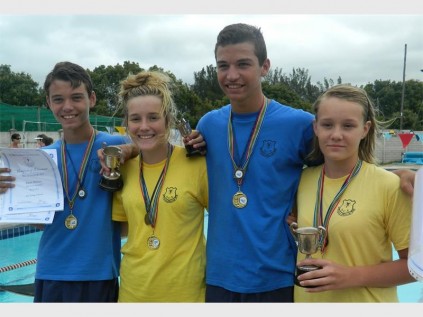 Southcity College sibling swimming sensations (from left) Ruan Michau, Britney Pieterse, Jeandre Michau and Denita-Sue Pieterse took top honours at last week's interhouse gala.