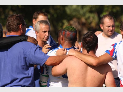 Team talk: Coach Christo Henderson fires up the Warriors.