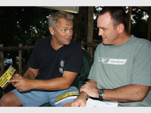 Kevin Stott (left) and Grant Nevett, waiting for their training partner Clint Kendall, who appears to have missed another Thursday ride.