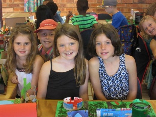 Created from plan: Creston College Junior Primary pupils (from left) Paige Robertson, Wesley Francis, Rylee Kendall and Cayla Guest are very proud of the model farms they created from everyday common items.